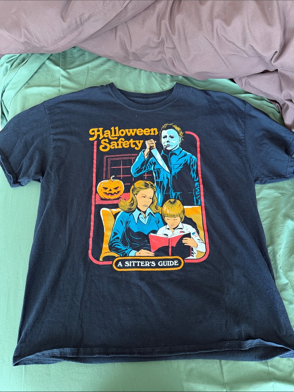 Halloween Safety Graphic Tee — Black with Orange & Blue Print